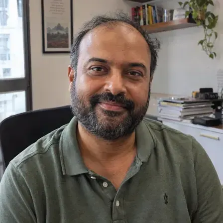 Agency owner in an everyday workspace